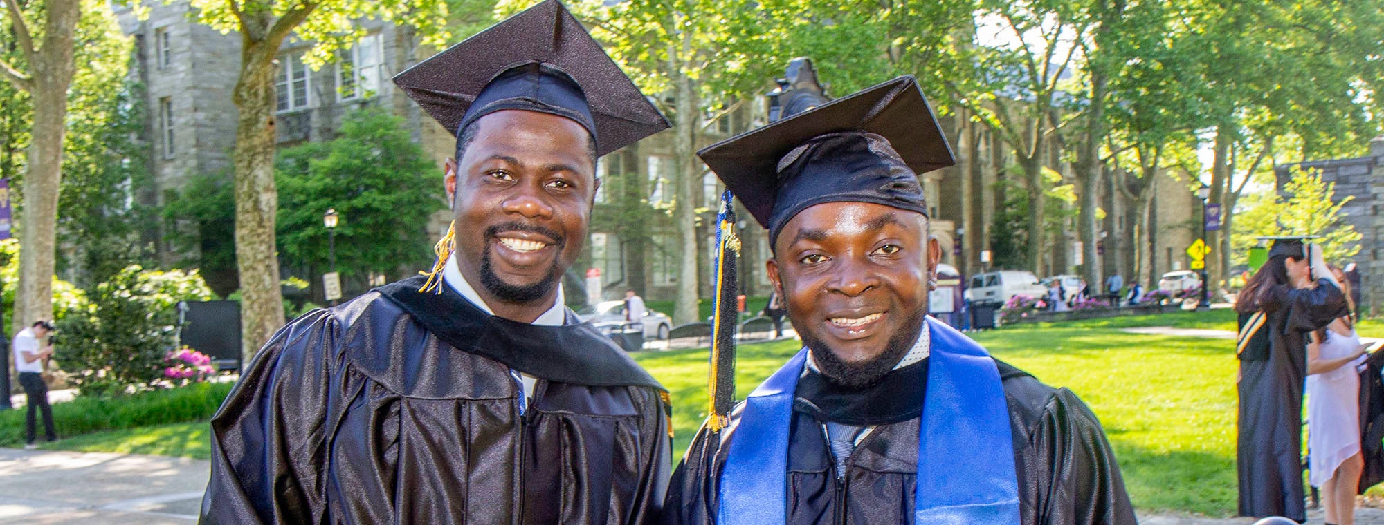 Two graduates at 2019 Commencement