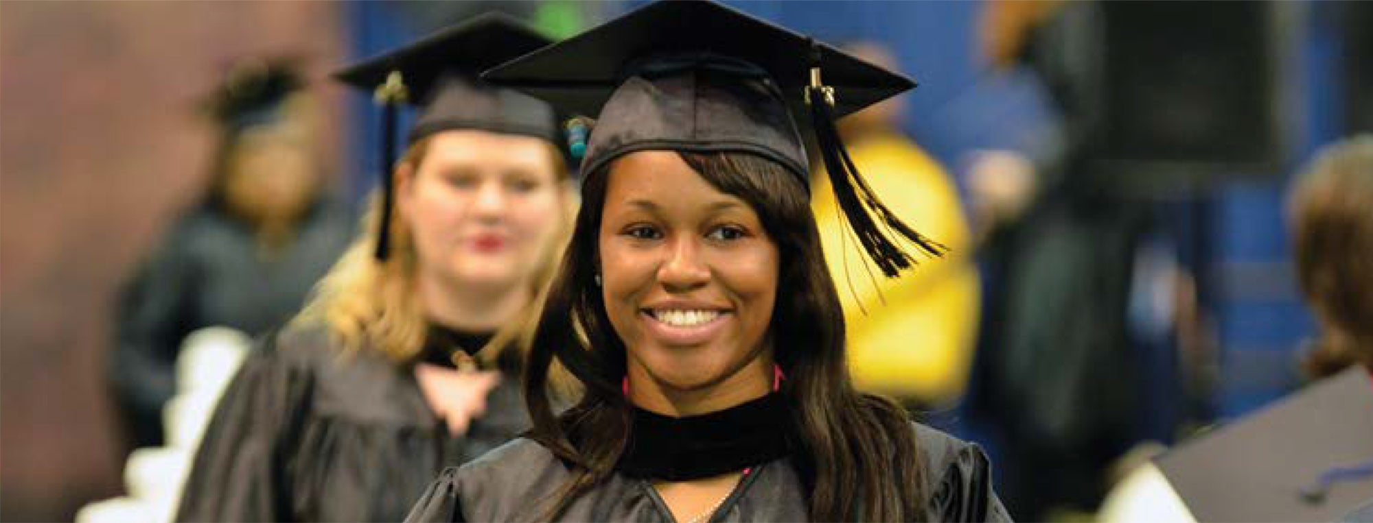 Image of student in graduation cap and gown