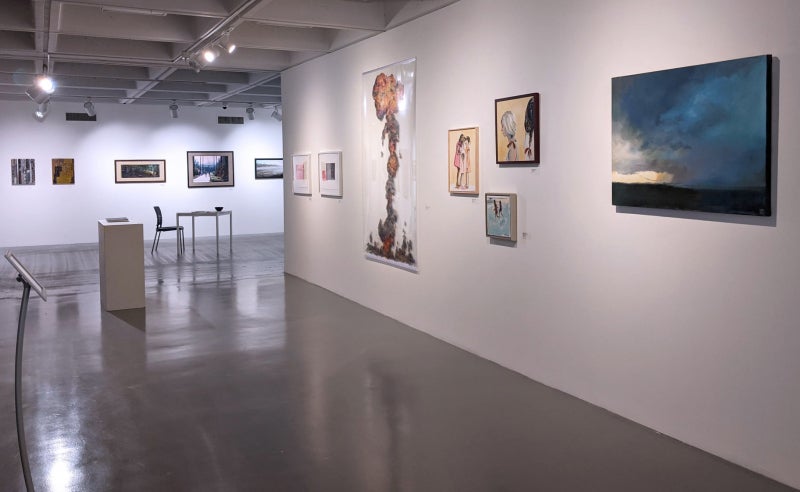View of Gallery with artwork installed on walls.
