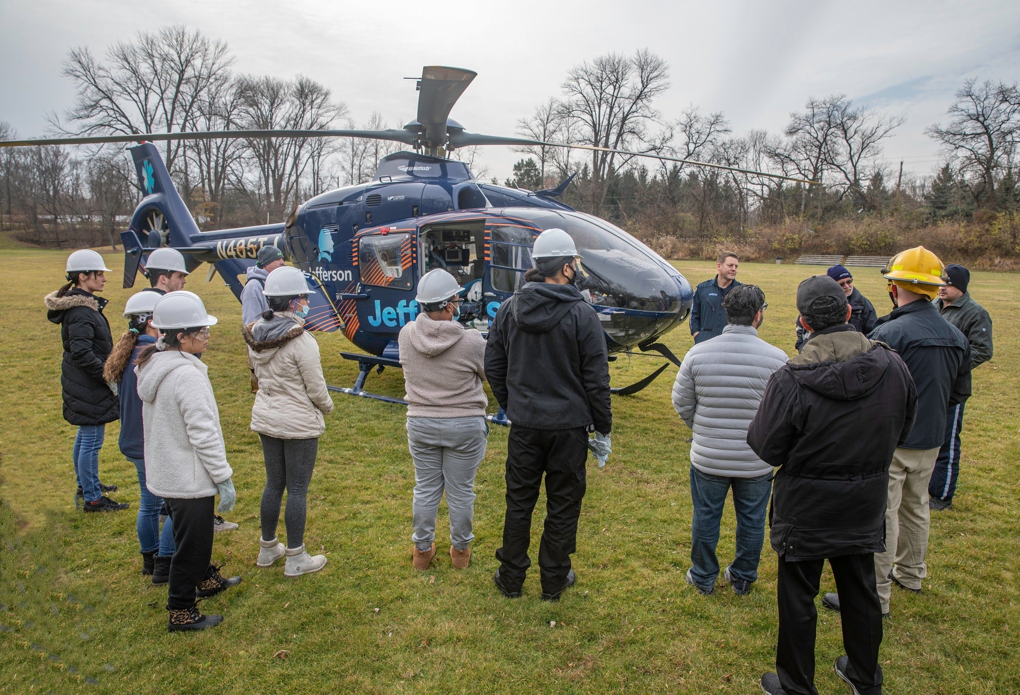 EMS-100 students listen and ask questions of members of the JeffSTAT Air Ambulance team that brought one of JeffSTAT’s air ambulance helicopters to the College’s Marple Campus for an emergency medical services lab demonstration