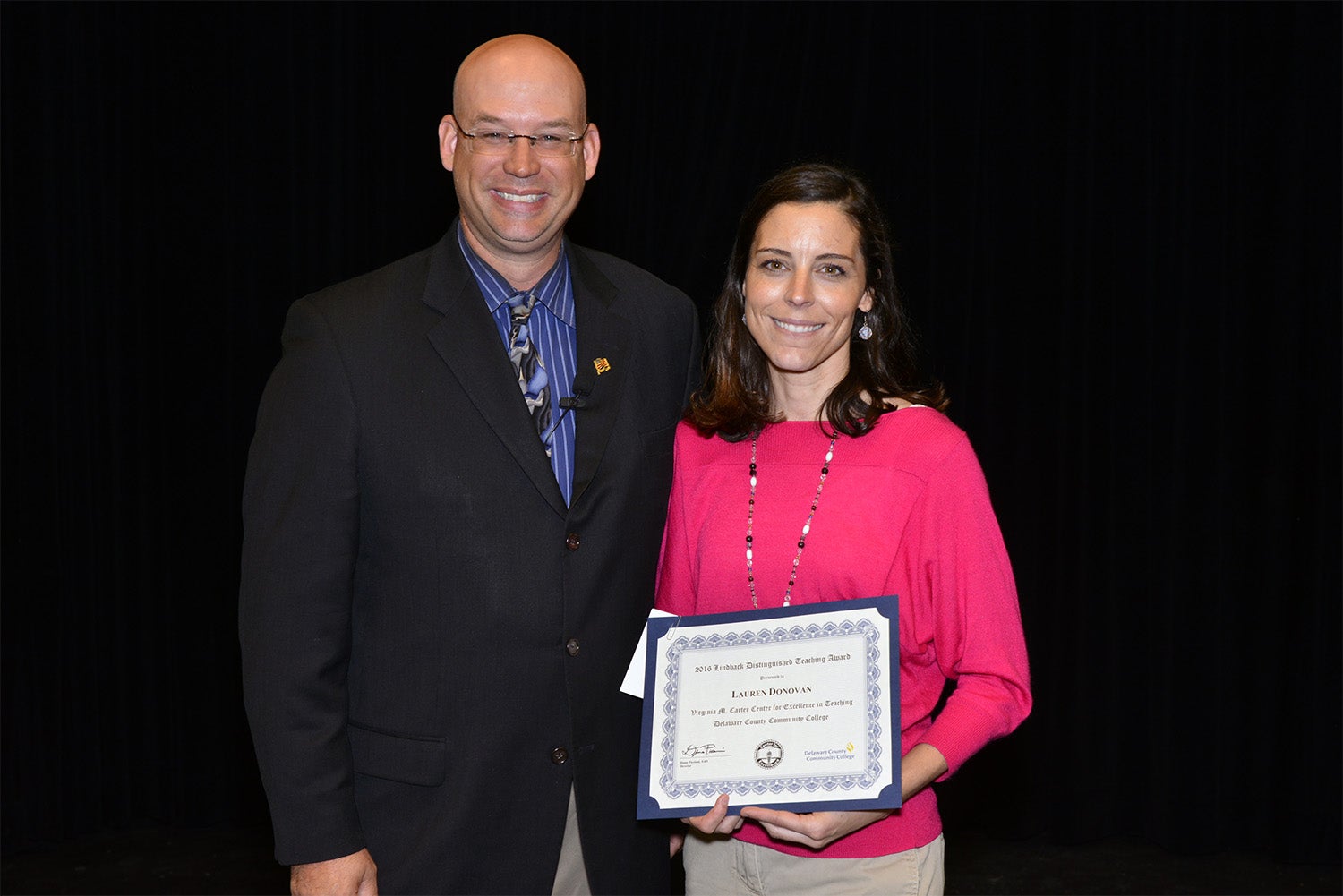 Lauren Donovan, Assistant Professor of Business at Delaware County Community College, receives the Lindback Award for Distinguished Teaching from Provost Dr. Eric Wellington