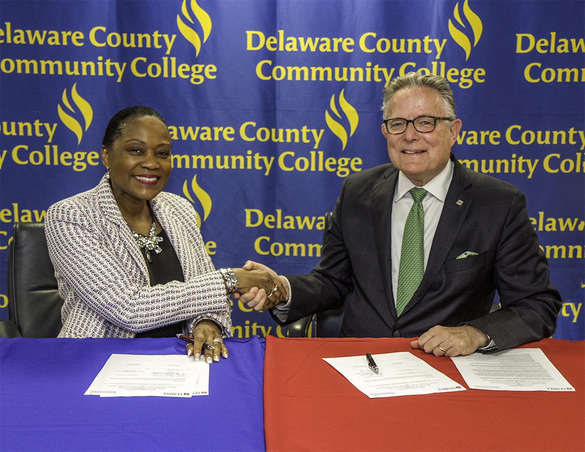 Dr. L. Joy Gates Black, president of Delaware County Community College and David Boardman, dean of Temple University’s Klein College of Media and Communication after signing the program-to-program transfer agreement