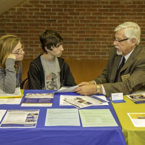 2015 Fall Open House students talking to vendors