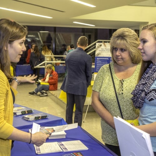 2015 Fall Open House students talking to vendors