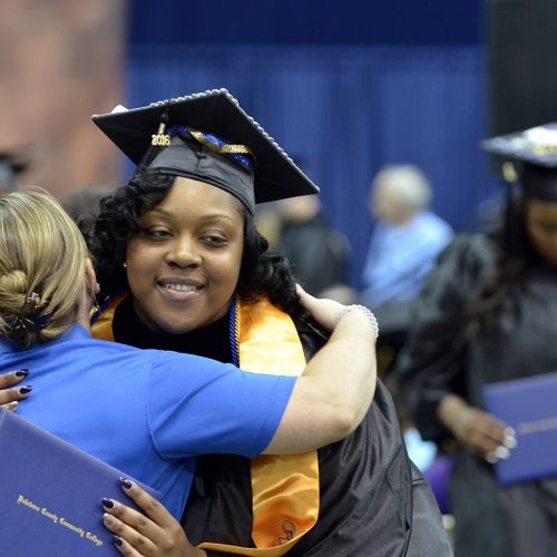 Graduate gets a hug
