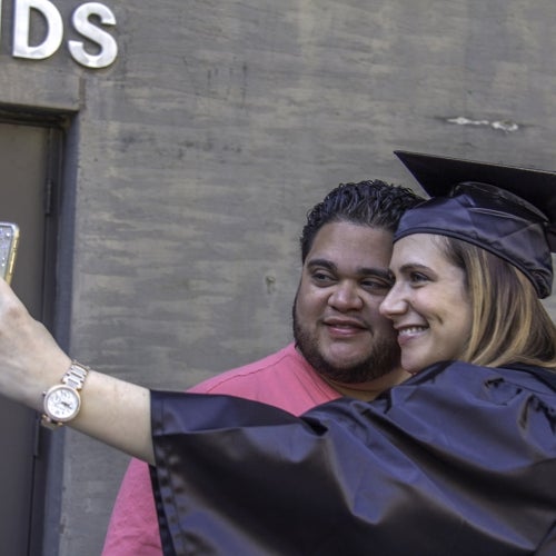 Graduate taking a selfie