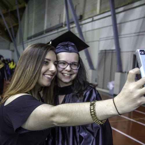 Graduate takes selfie