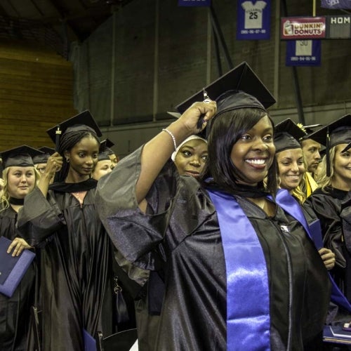 Students turning tassels after graduating