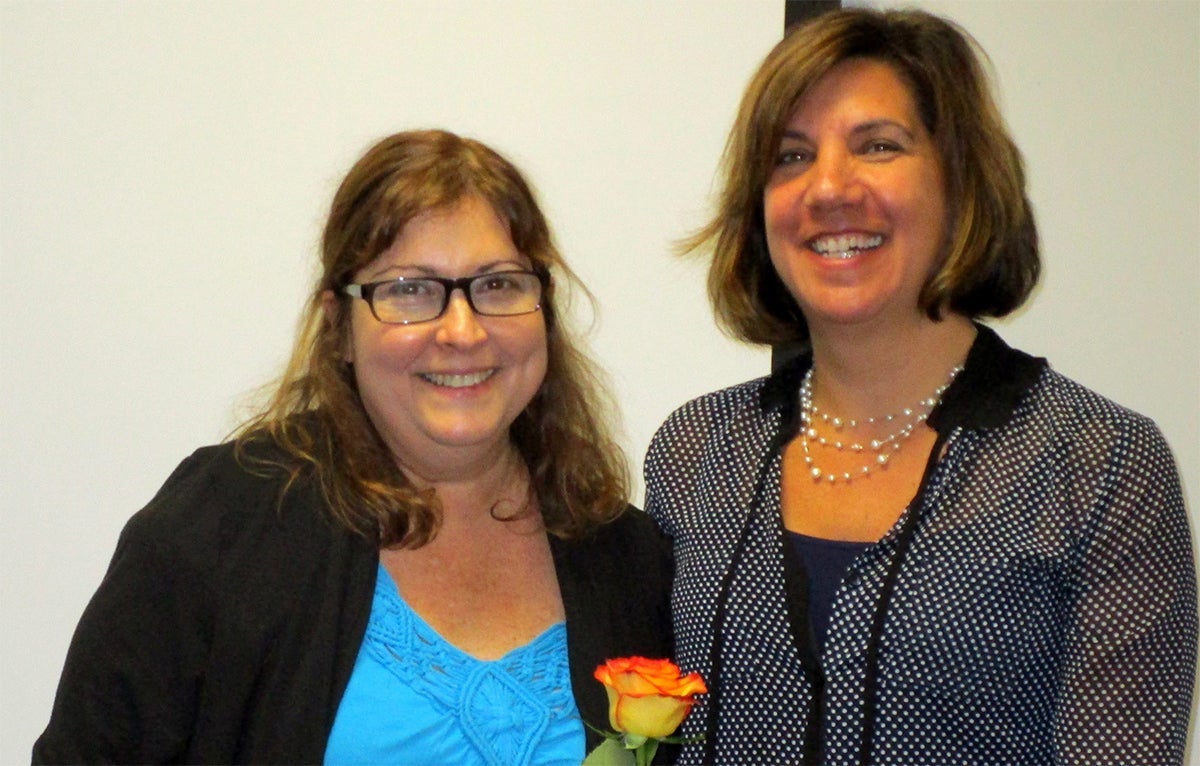 Photo of New Choices graduate with instructor