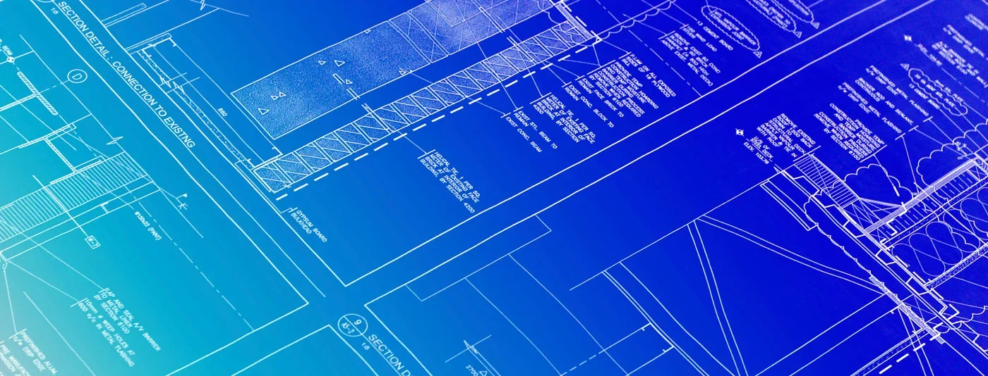 Close-up view of detailed architectural blueprints showcasing technical drawings and plans on a gradient blue background.