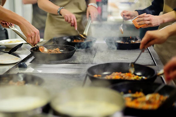 simmering pots on a stove