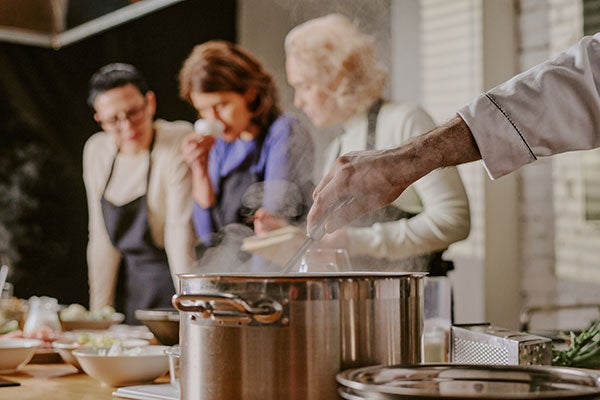 cooking class with large soup pot