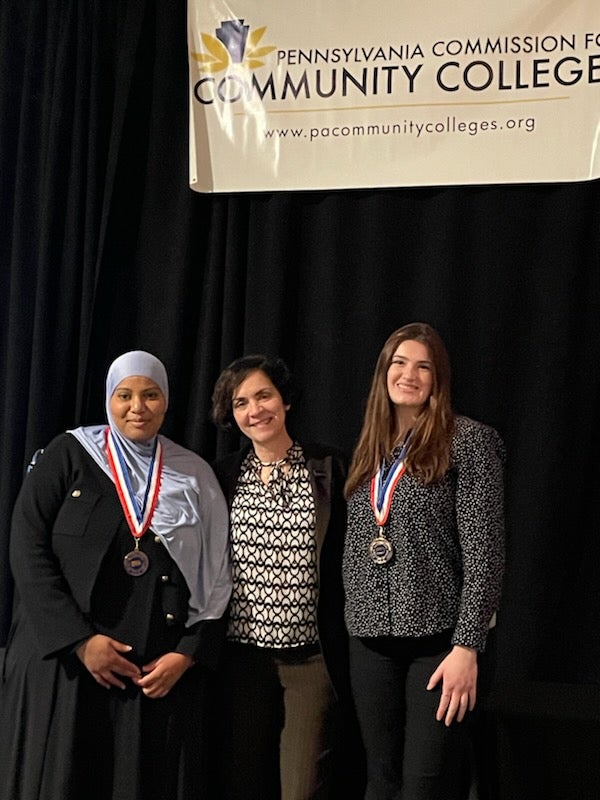 DCCC President Dr. Marta Yera Cronin with All-PA Academic Team honorees Umniyah Al-Haneef of Folcroft and Brooke Weiss of Exton. Not pictured: Marie Camara and Liz Mercadante. Courtesy DCCC.