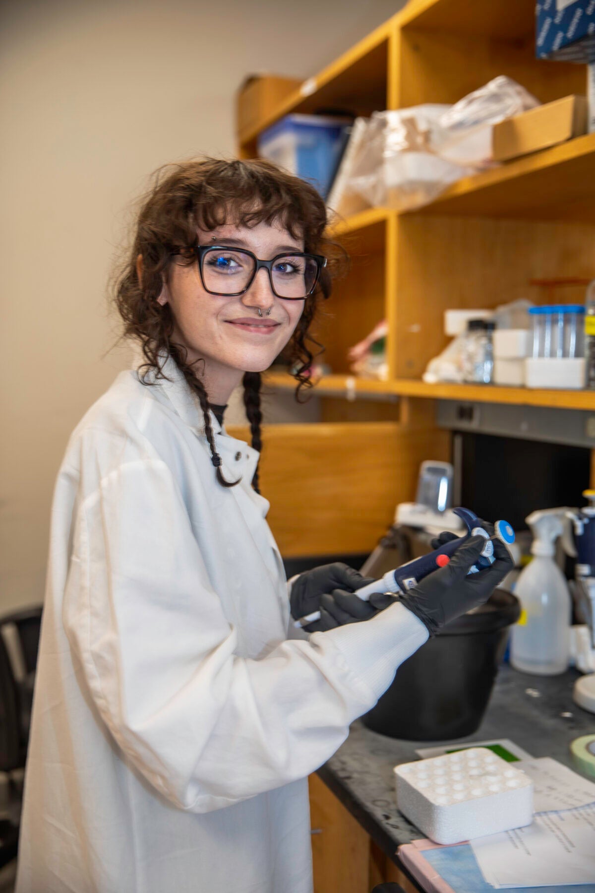 DCCC student Lillian Yost at work in the lab at The Wistar Institute. 