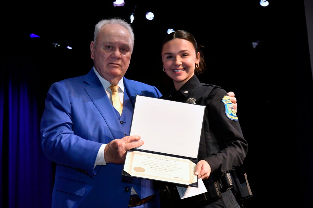 A female graduate from DCCC's Municipal Police Academy.