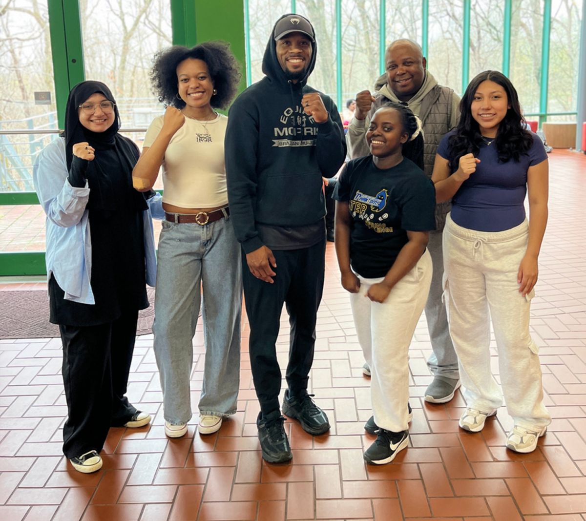 Students pose during the Student Outreach Programming Board's self-defense workshop.