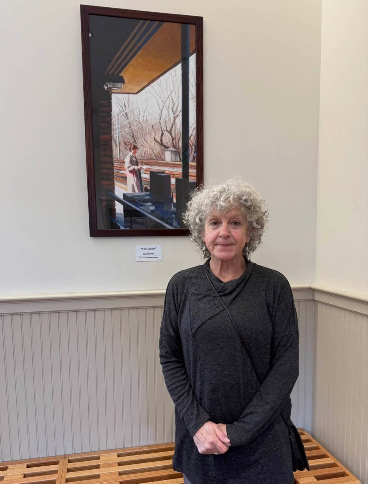 Lisa Learner-Wagner and her painting.