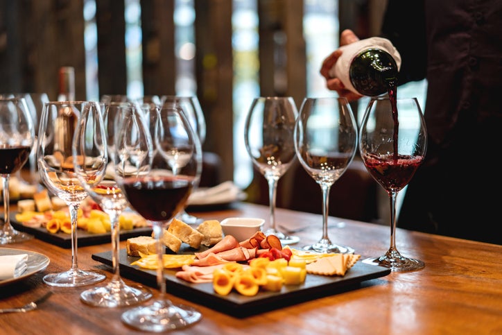Table with wine glasses and appetizers