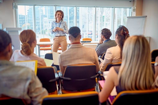 Female instructor giving corporate training