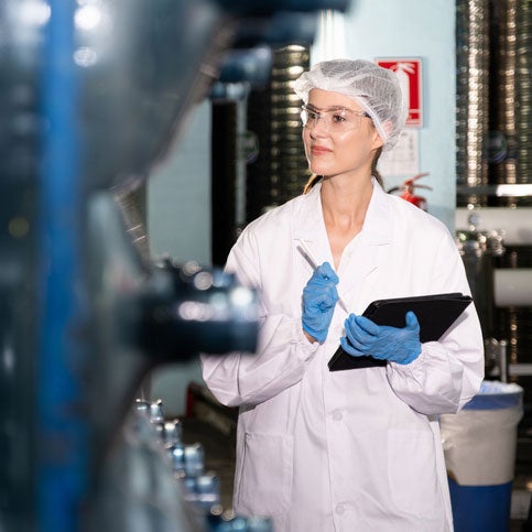 Female employee with clipboard