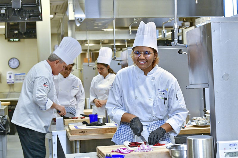 culinary student smiling at camera