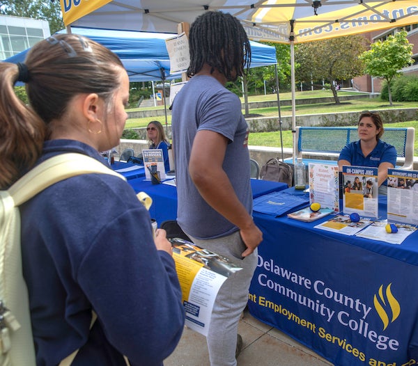 Students at information table